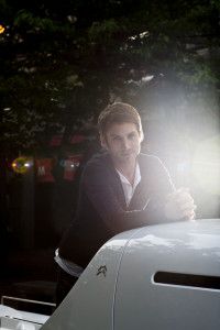 Designer Ora-Ïto with a concept car at night, Milan 2011