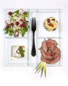 Salad, roast beef and terrine in a glass tray, food editorial 2005