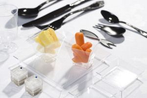 Cutlery with fruit and vegetables in glass bowls, food editorial 2005