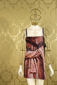 Printed silk dress on a mannequin against gold damask, Miu Miu look book 2008