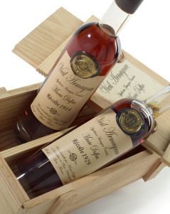 Vintage Armagnac bottles in a wooden case, Chez Pierre catalogue
