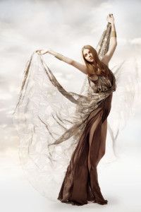 Model with a sheer brown and gold gown, Sur la Terre inTown 2012