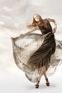 Model twirling a palm-print gown, Sur la Terre inTown 2012