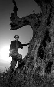 Model against an old olive tree, black and white, Sur la Terre inTown, Greece 2012