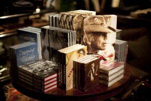 Books and a hat on a display table, Ralph Lauren store, Milan