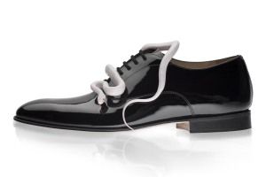 Church's patent shoe with a white snake as laces