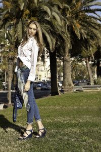Model in white shirt and jeans in a palm garden, Nice, Germano Zama catalogue S/S 2012