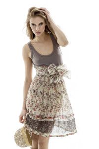 Model in floral dress with straw hat, Germano Zama look book S/S 2013