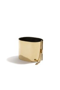 Gold cuff bracelet, Harper's Bazaar editorial 2013