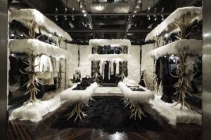 Prada Sport store dressed with fur and branches, Corso Venezia, Milan