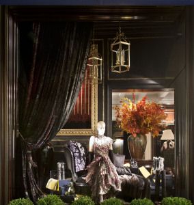 Ralph Lauren shop window with evening dress and antique furniture, via Montenapoleone, Milan