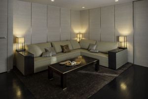 Living room with corner sofa and table lamps, Armani/Casa residence, Century Spire, Manila
