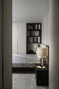 Bedroom with bookcase and table lamp, Armani/Casa residence, Century Spire, Manila