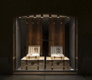 Dolce & Gabbana shop window with wicker picnic hampers, Milan