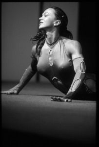 Fitness athlete stretching on the floor, black and white