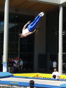 Trampoline gymnast somersaulting in the air