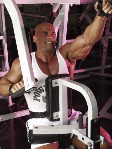 Bodybuilder on a chest press machine