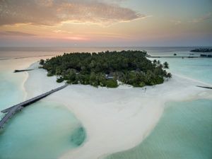 Garden Water Villas and sandbank at sunset, Cheval Blanc Randheli, Maldives, aerial view