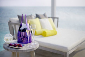 Champagne on ice by a seaside daybed, Cheval Blanc Randheli, Maldives