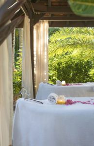 Romantic spa set-up with rose petals in a garden pavilion, Cheval Blanc St-Barth