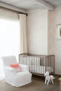Children's room with cot, armchair and toy horse, Cheval Blanc St-Barth