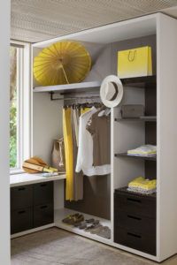 Men's dressing room with hat, umbrella and resort clothes, Cheval Blanc Randheli, Maldives