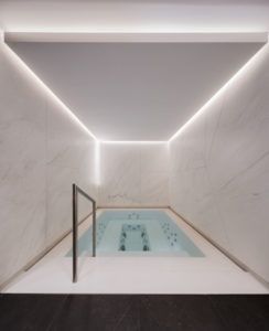 Marble plunge pool with hidden lighting, White 1921 hotel, Courchevel