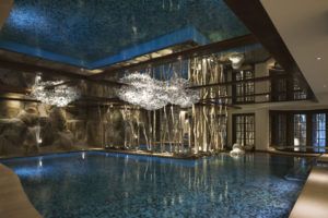 Indoor pool with sculptural lighting, Cheval Blanc Courchevel