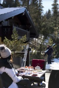 Skier's afternoon tea on the terrace of Le Triptyque, Cheval Blanc Courchevel