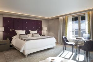 Superior Deluxe bedroom with purple headboard, Cheval Blanc Courchevel