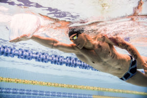 Male swimmer in freestyle stroke, underwater view, arena Water Instinct S/S 2018 catalogue