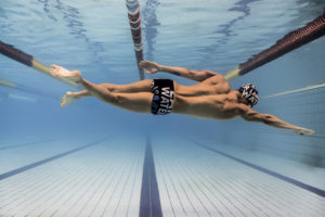 Male swimmer underwater in jammers, arena Water Instinct S/S 2018 catalogue