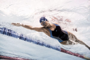 Female swimmer gliding underwater, arena Water Instinct S/S 2018 catalogue