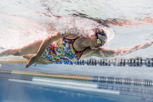 Swimmer in a multicoloured swimsuit, underwater, arena Water Instinct S/S 2018 catalogue